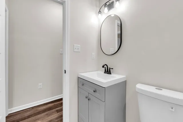 a bathroom with a toilet and a sink