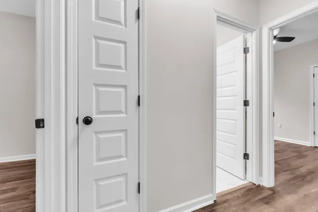 a view of a bathroom with a glass door