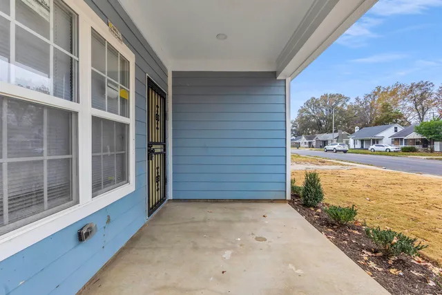 a view of a balcony with ocean view