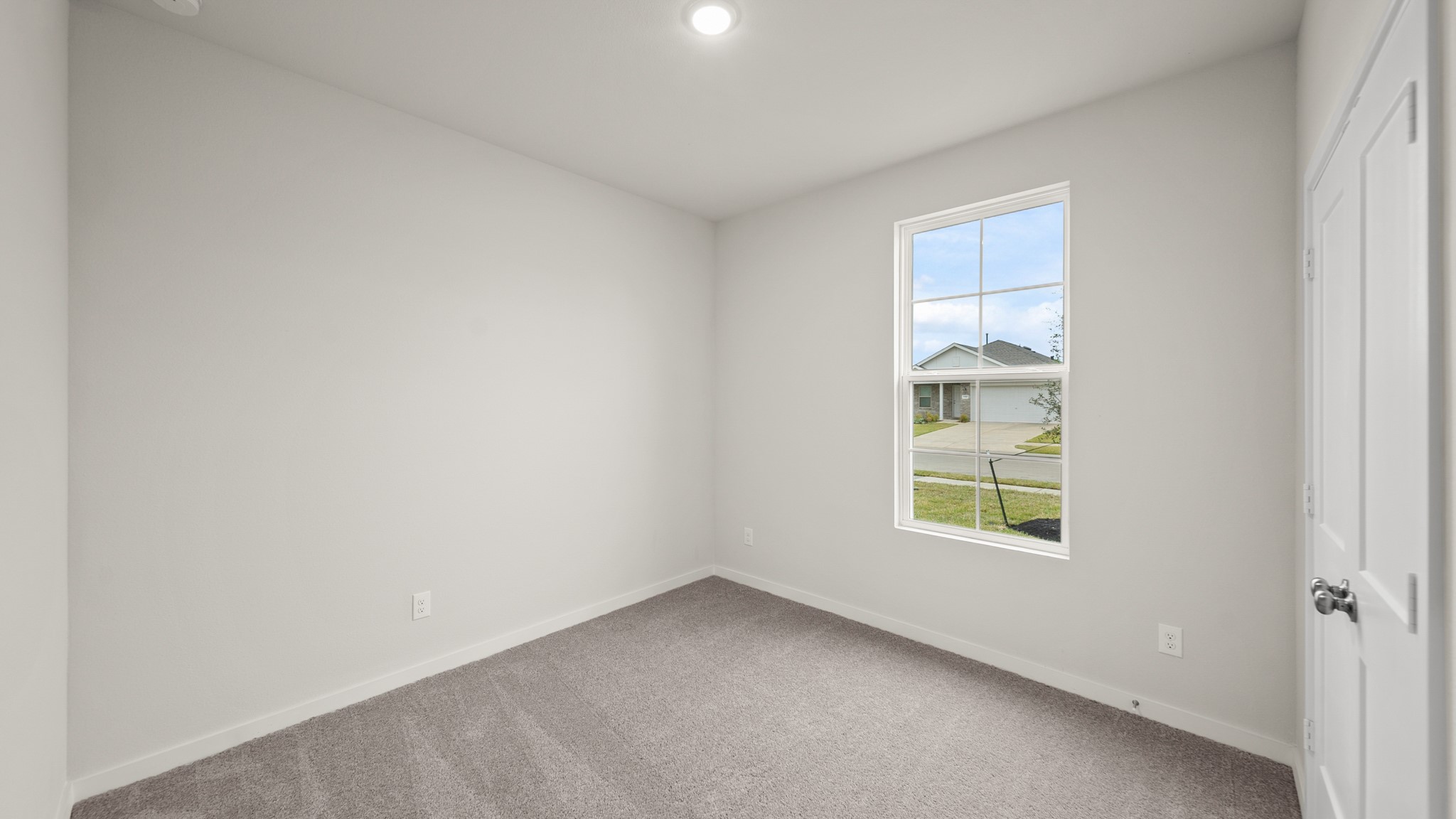 26051 Spiney Thistle Road Katy, TX 77493 - Photo 15 of 22 an empty room with windows