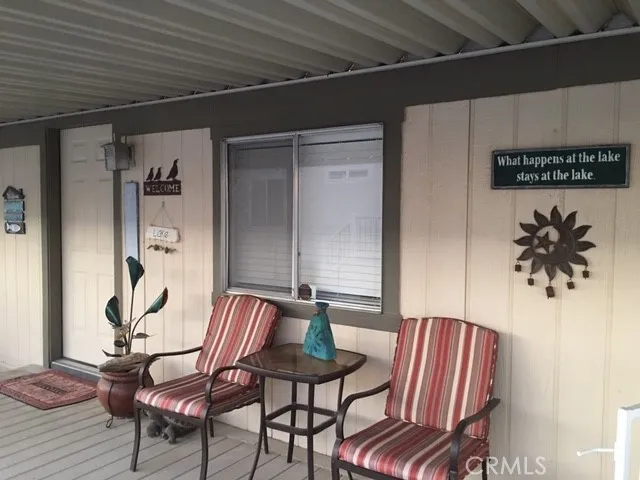 a view of a livingroom with furniture and a table