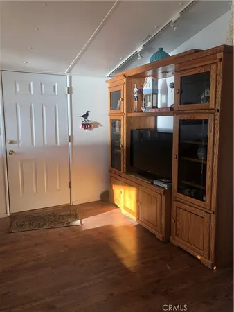 a view of a living room with a large window