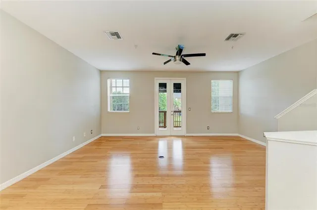 a view of a balcony with wooden floor