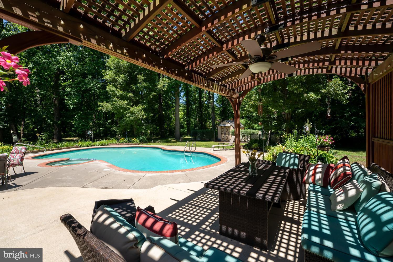 814 Wrights Neck Road Centreville, MD 21617 - Photo 20 of 53 a view of a chairs and tables in the patio
