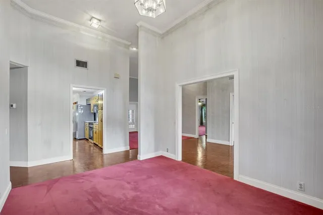a view of a livingroom with furniture and a ceiling fan