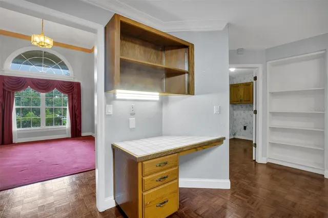 a view of livingroom with furniture fan and window
