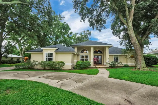 front view of a house with a yard