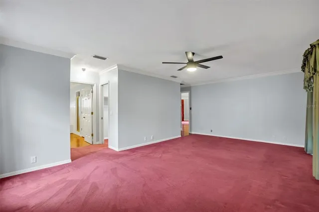 a view of a garage and car parked