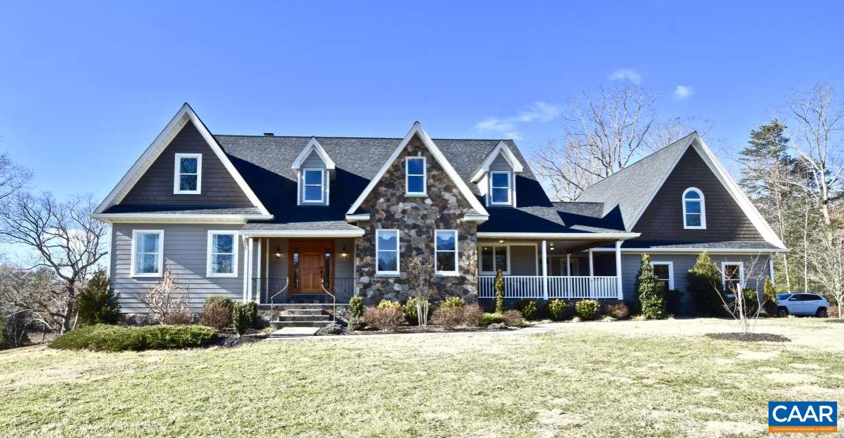 2852 Milton Road Charlottesville, VA 22902 - Photo 1 of 49 a front view of a house with a yard