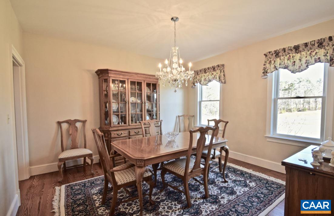 2852 Milton Road Charlottesville, VA 22902 - Photo 14 of 49 a view of a dining room with furniture and chandelier