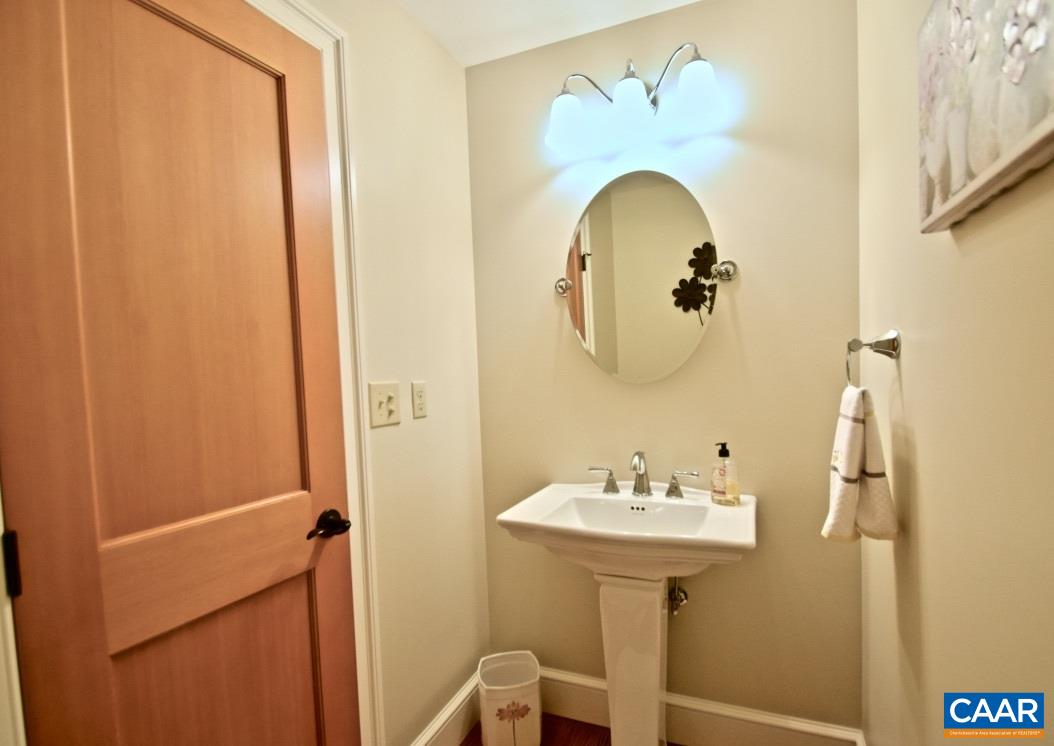 2852 Milton Road Charlottesville, VA 22902 - Photo 15 of 49 a bathroom with a sink mirror and vanity
