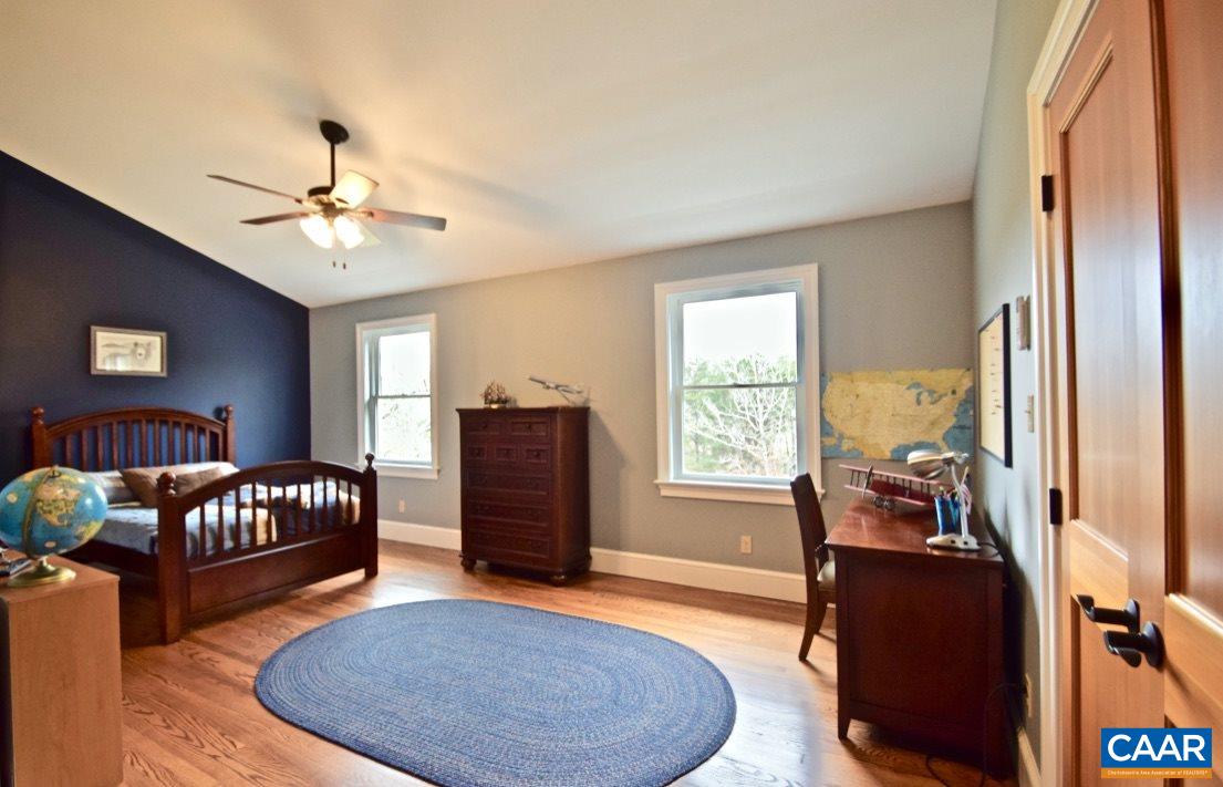 2852 Milton Road Charlottesville, VA 22902 - Photo 28 of 49 a bedroom with furniture fireplace and window