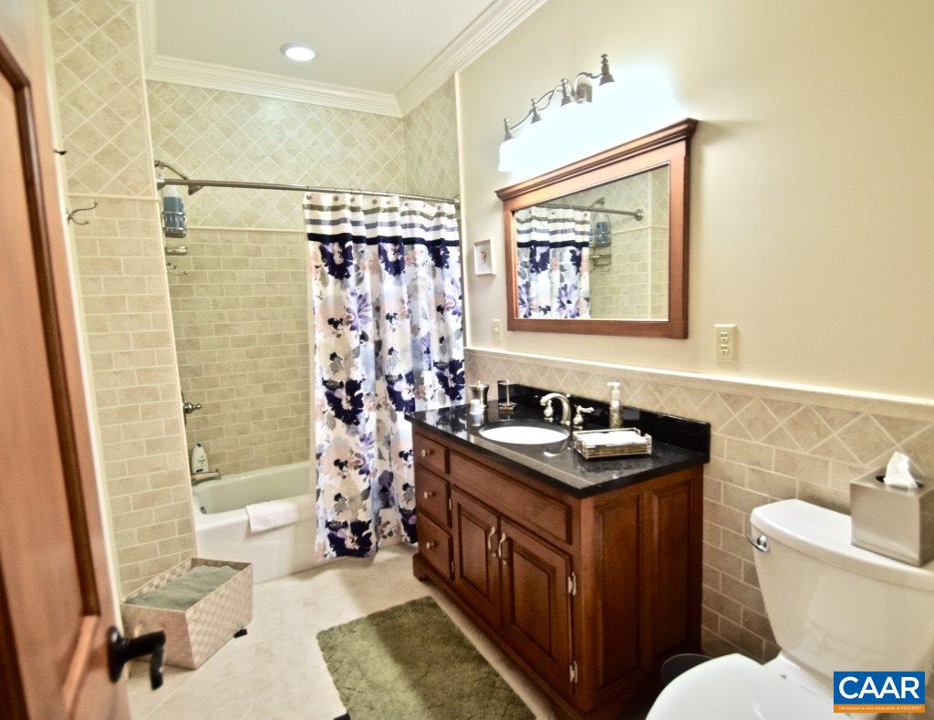 2852 Milton Road Charlottesville, VA 22902 - Photo 37 of 49 a bathroom with a sink toilet and shower