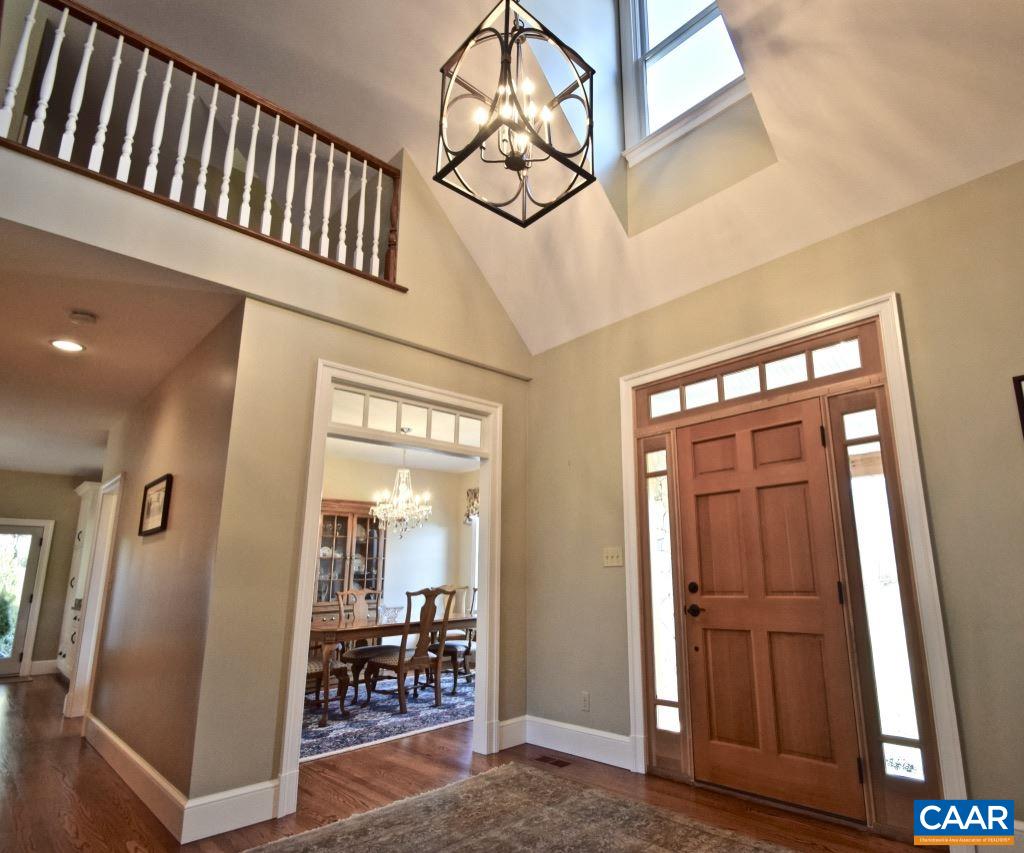2852 Milton Road Charlottesville, VA 22902 - Photo 4 of 49 en view interior of a house with wooden floor and stairs