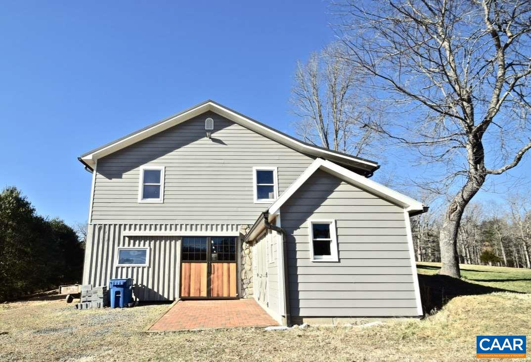 2852 Milton Road Charlottesville, VA 22902 - Photo 44 of 49 a front view of a house with a yard