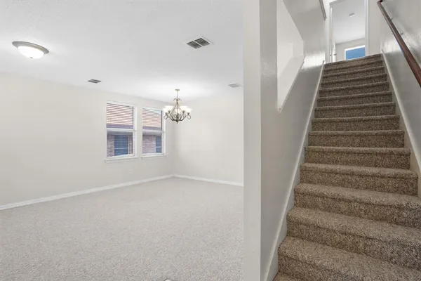 a view of an entryway with staircase