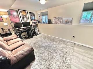 5 Saxton Road Farmingdale, NJ 07727 - Photo 12 of 39 a living room with furniture and a flat screen tv