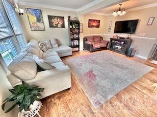 5 Saxton Road Farmingdale, NJ 07727 - Photo 22 of 39 a living room with furniture and a flat screen tv