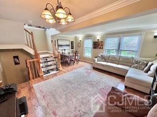 5 Saxton Road Farmingdale, NJ 07727 - Photo 24 of 39 a living room with furniture and a large window