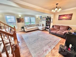 5 Saxton Road Farmingdale, NJ 07727 - Photo 28 of 39 a living room with furniture and a flat screen tv