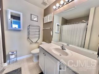 5 Saxton Road Farmingdale, NJ 07727 - Photo 29 of 39 a bathroom with a sink a toilet and a mirror