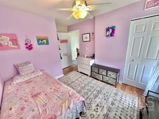 5 Saxton Road Farmingdale, NJ 07727 - Photo 30 of 39 a bedroom with a bed and a couch