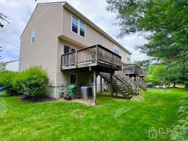 5 Saxton Road Farmingdale, NJ 07727 - Photo 7 of 39 a view of a house with a yard and sitting area