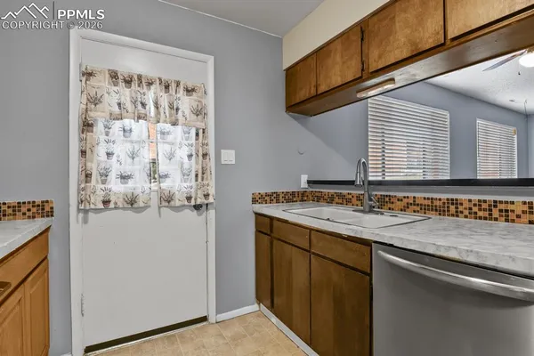 a utility room with washer and dryer