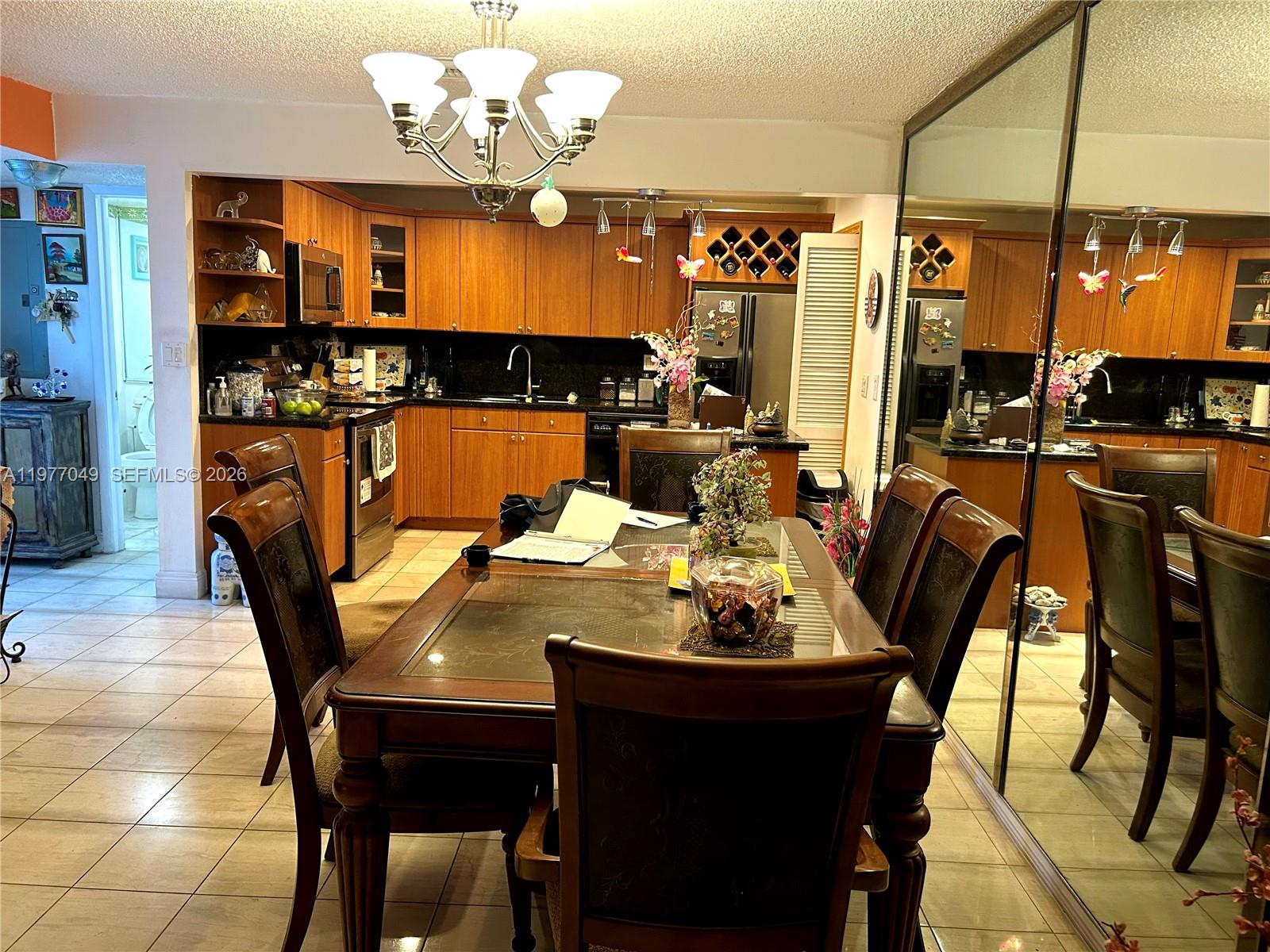 11219 Southwest 33 Rd Circle Place Brooklyn, FL 11219 - Photo 2 of 17 a view of a dining room with furniture