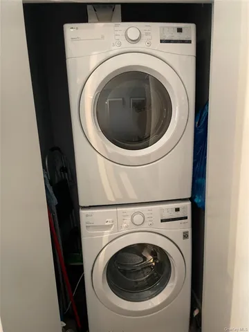 a close up view of a washer and dryer in a utility room