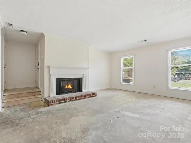 an empty room with windows