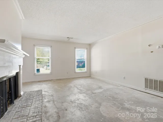 an empty room with windows