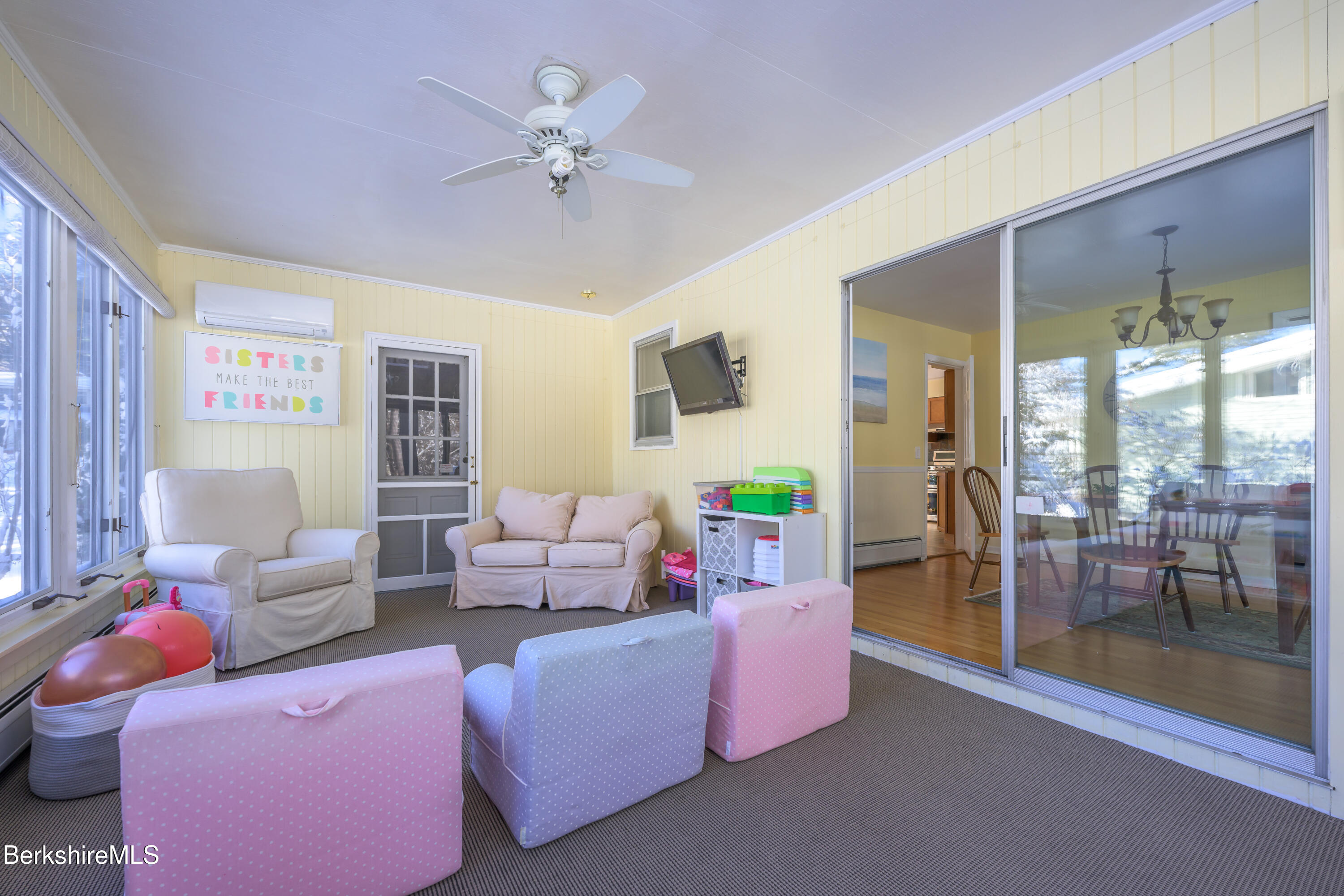 40 Leroi Drive Pittsfield, MA 01201 - Photo 19 of 38 a living room with furniture and a floor to ceiling window