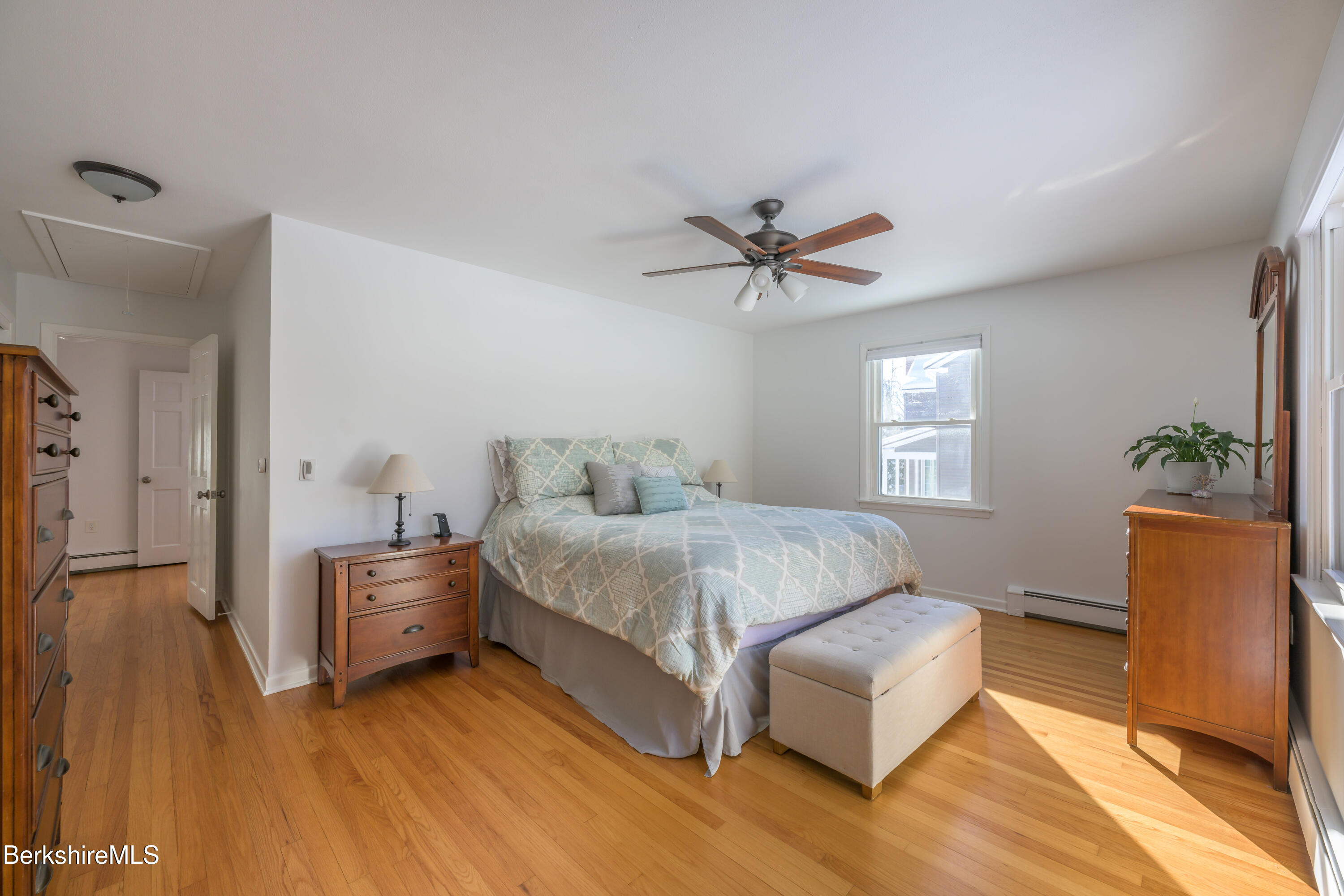 40 Leroi Drive Pittsfield, MA 01201 - Photo 26 of 38 a spacious bedroom with a bed and a couch