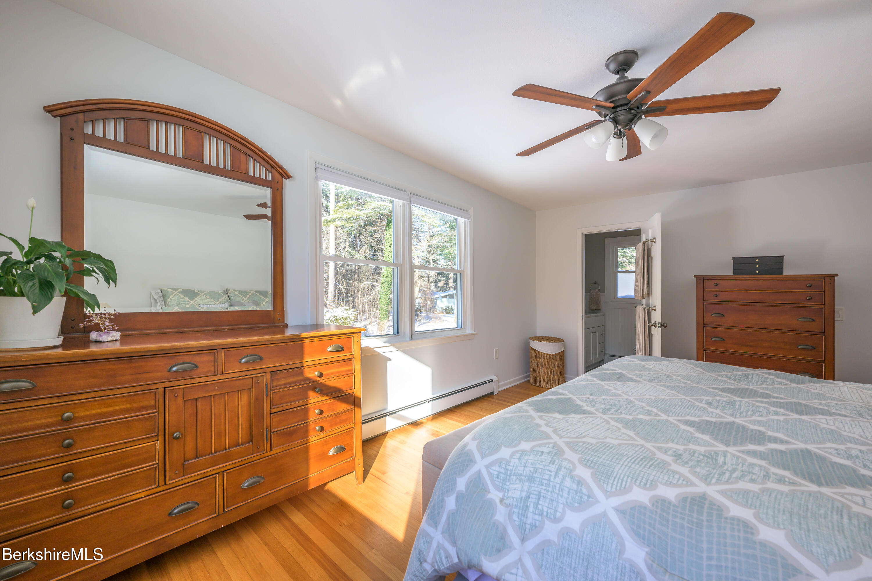 40 Leroi Drive Pittsfield, MA 01201 - Photo 27 of 38 a bedroom with a bed and a dresser