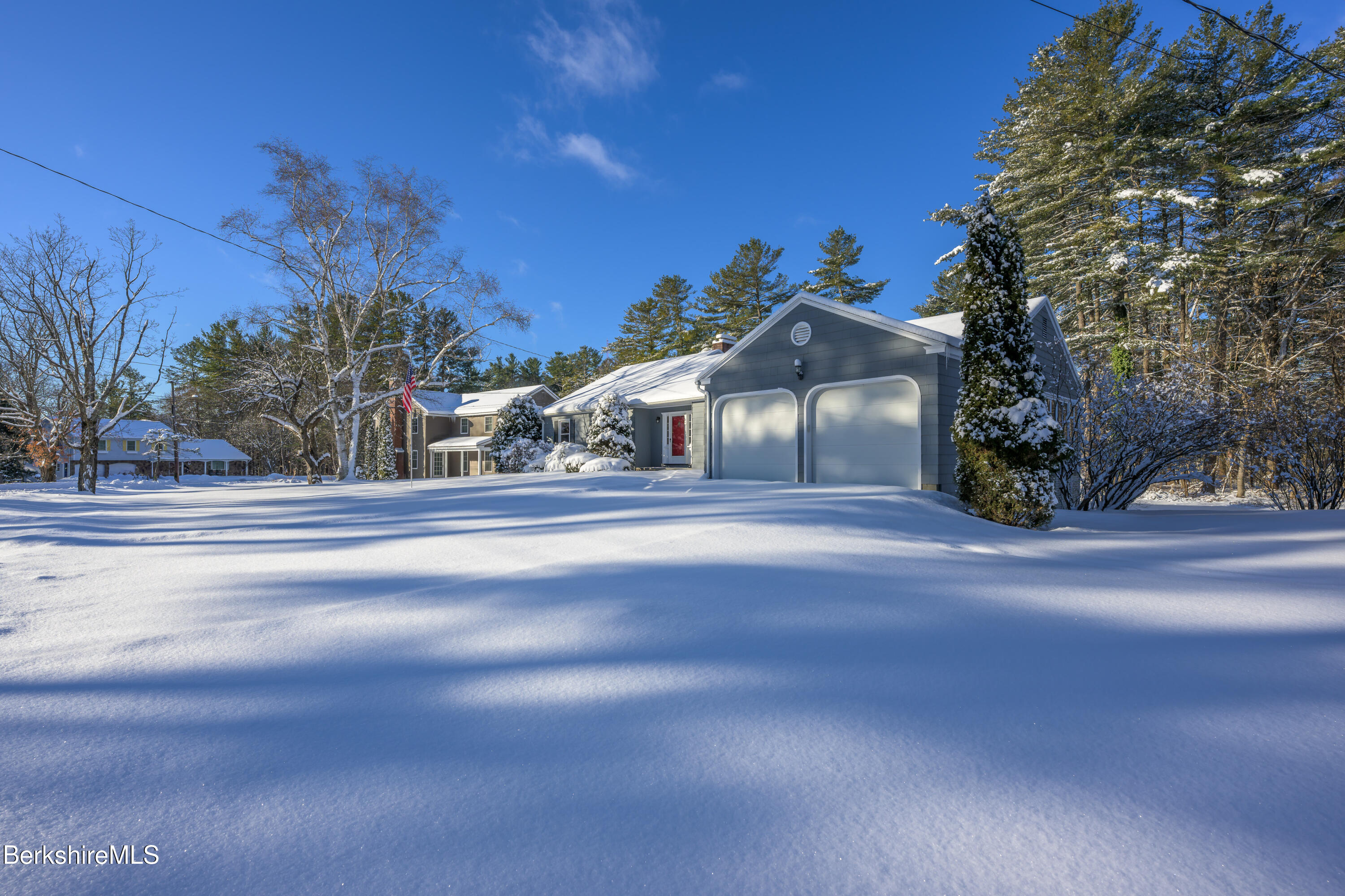 40 Leroi Drive Pittsfield, MA 01201 - Photo 3 of 38 a front view of a house with a yard and garage