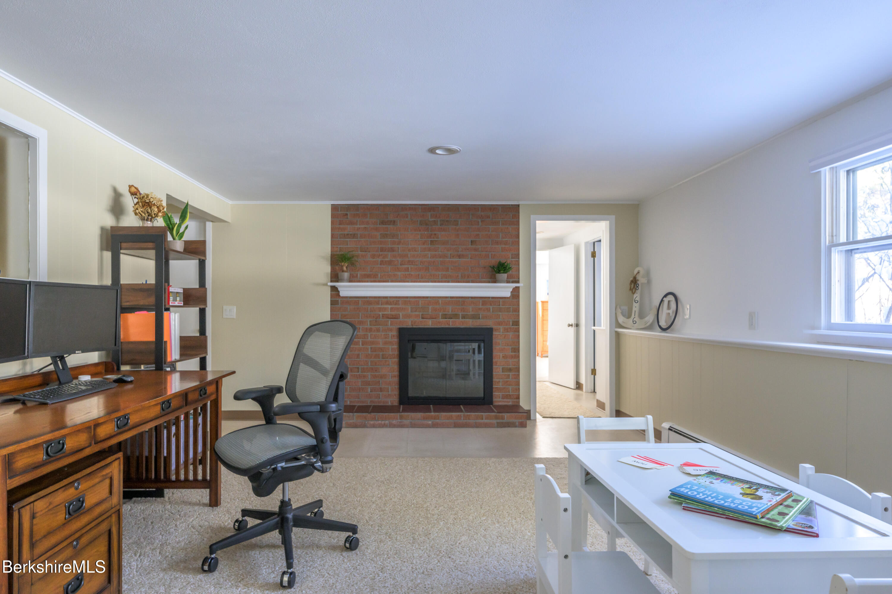 40 Leroi Drive Pittsfield, MA 01201 - Photo 31 of 38 a workspace with furniture and a fireplace