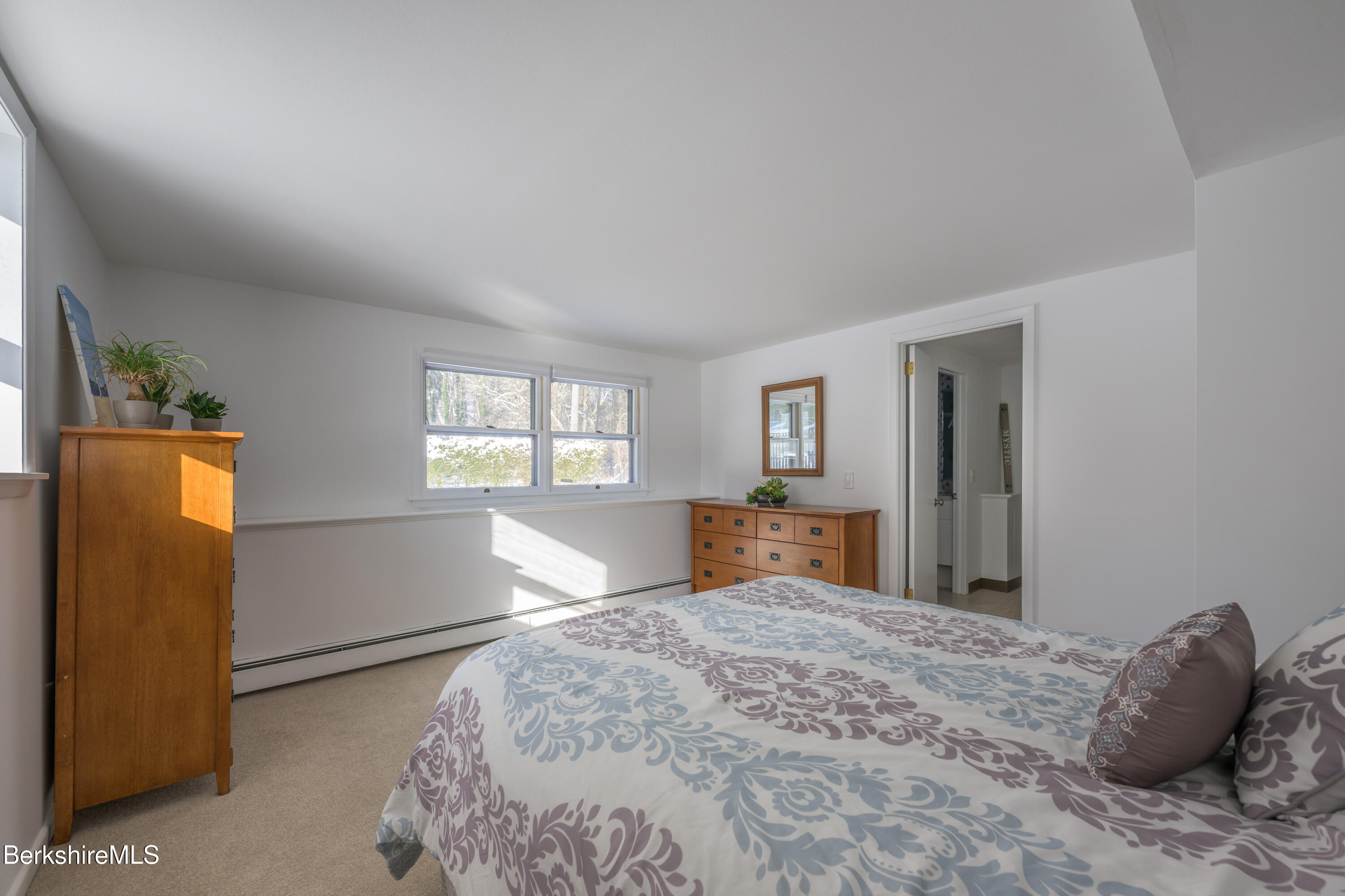 40 Leroi Drive Pittsfield, MA 01201 - Photo 33 of 38 a bedroom with a large bed and a window