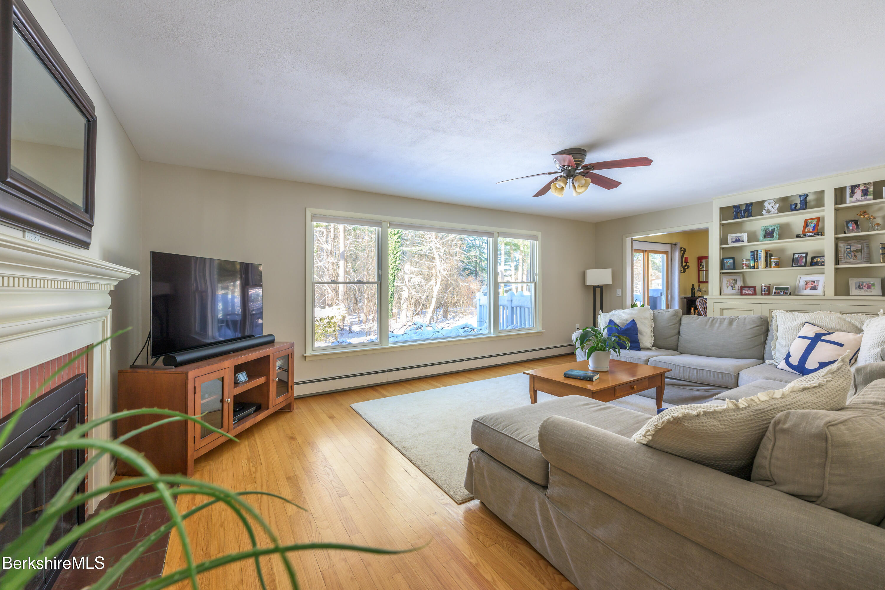 40 Leroi Drive Pittsfield, MA 01201 - Photo 9 of 38 a living room with furniture and a flat screen tv