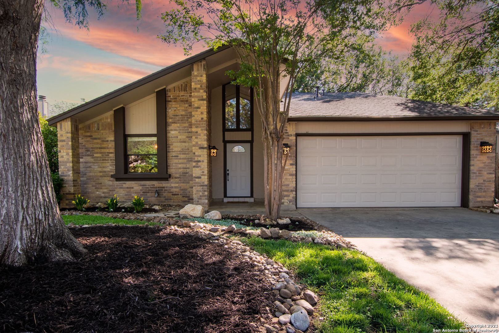 5934 Spring Valley San Antonio, TX 78247 - Photo 1 of 1 a front view of a house with garden