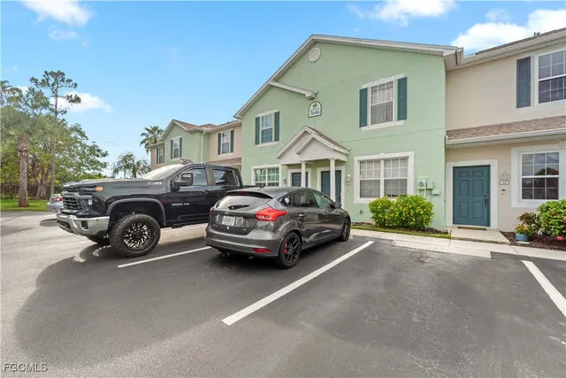 a car parked in front of a house