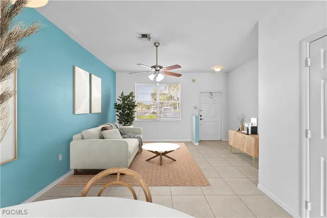 a living room with furniture and window