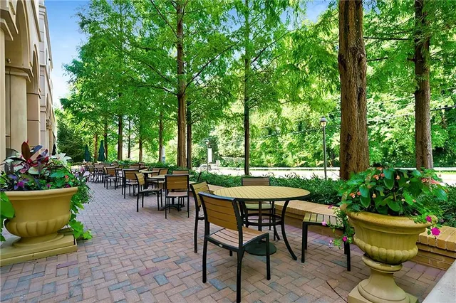 a view of a table and chairs in the patio