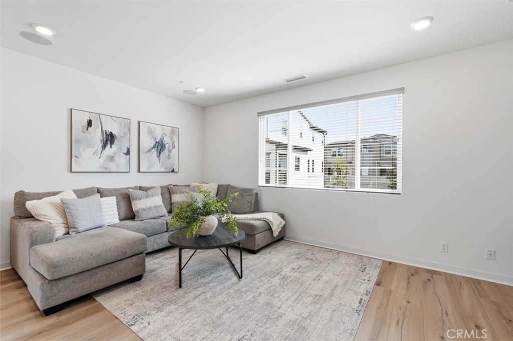 361 Gelding Way Rancho Mission Viejo, CA 92694 - Photo 18 of 59 a living room with furniture and a window