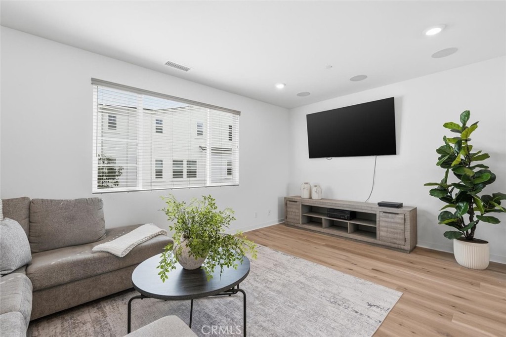 361 Gelding Way Rancho Mission Viejo, CA 92694 - Photo 19 of 59 a living room with furniture and a flat screen tv