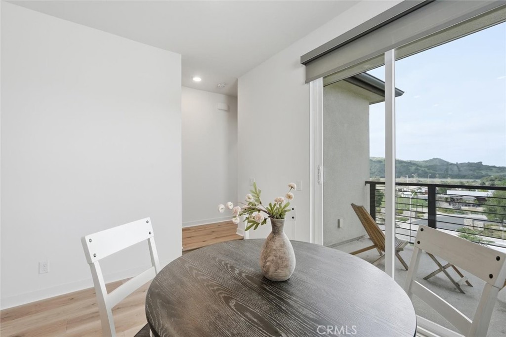 361 Gelding Way Rancho Mission Viejo, CA 92694 - Photo 26 of 59 a view of a dining room with furniture window and wooden floor