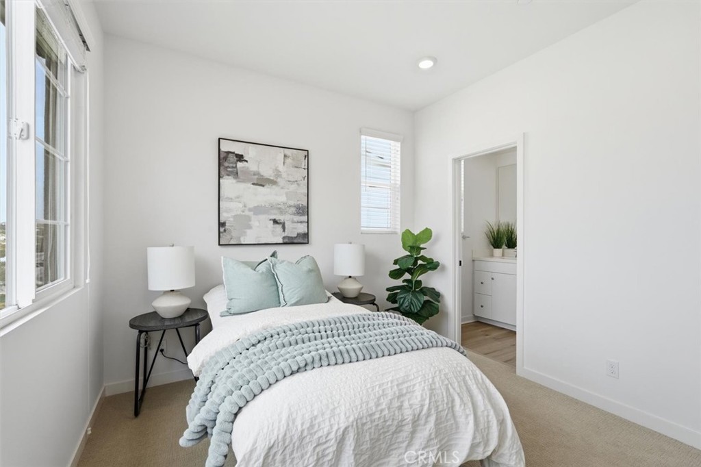 361 Gelding Way Rancho Mission Viejo, CA 92694 - Photo 34 of 59 a bed sitting in a bedroom next to a window