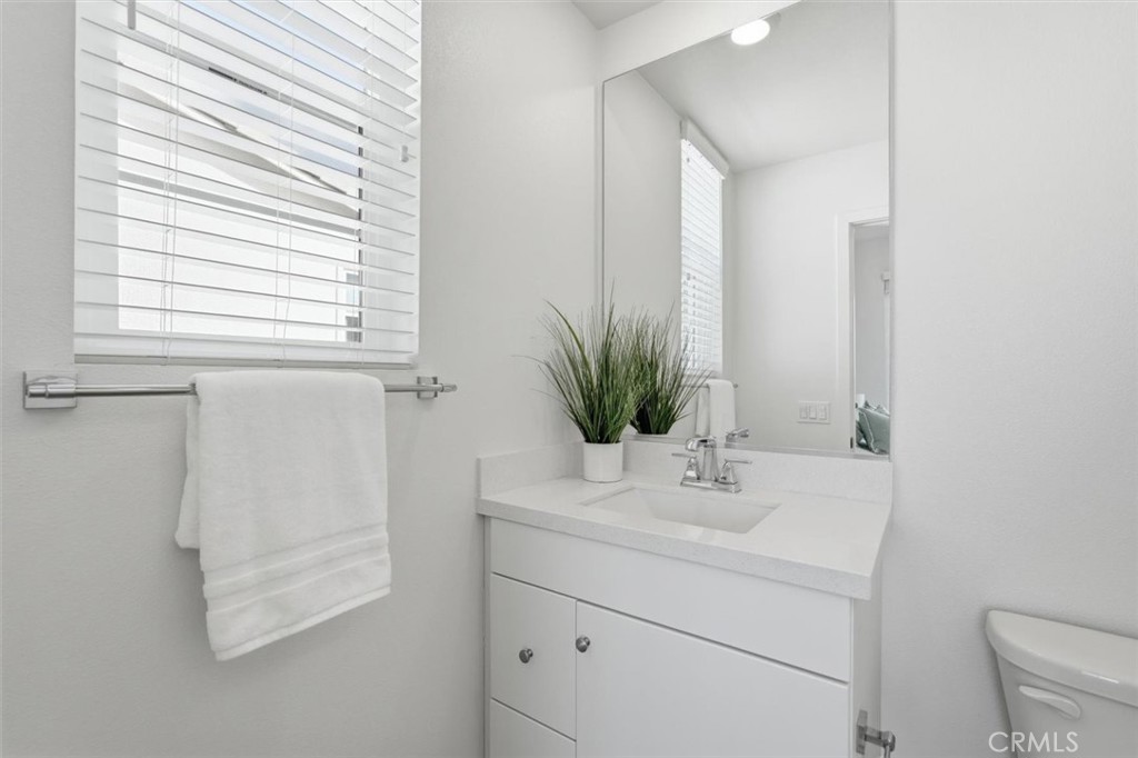 361 Gelding Way Rancho Mission Viejo, CA 92694 - Photo 35 of 59 a bathroom with a sink a vanity and a mirror
