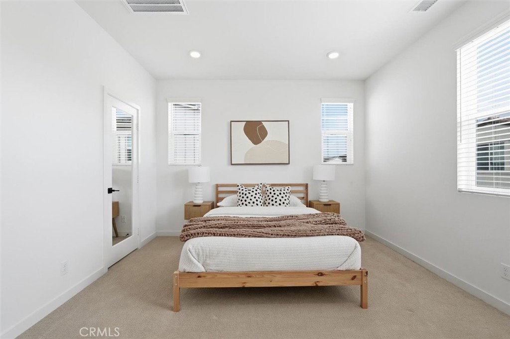 361 Gelding Way Rancho Mission Viejo, CA 92694 - Photo 38 of 59 a bedroom with a bed and a window