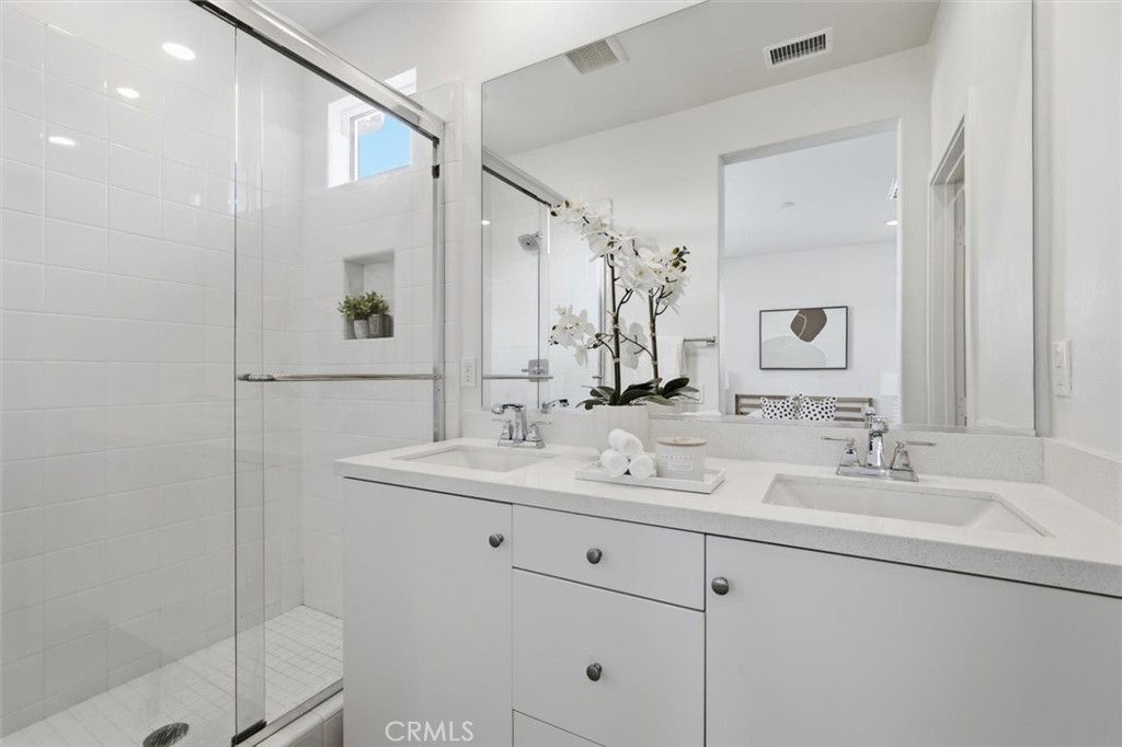 361 Gelding Way Rancho Mission Viejo, CA 92694 - Photo 44 of 59 a bathroom with a double vanity sink mirror and double